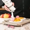 Garrafa Sifão Chantilly 250ML Inox, Dessert Culinária  Profissional iSi, 05 anos de garantia. Faça chantilly de forma fácil, rápida e economicamente. Preparos frios. Proteção branca, cabeçote PE.